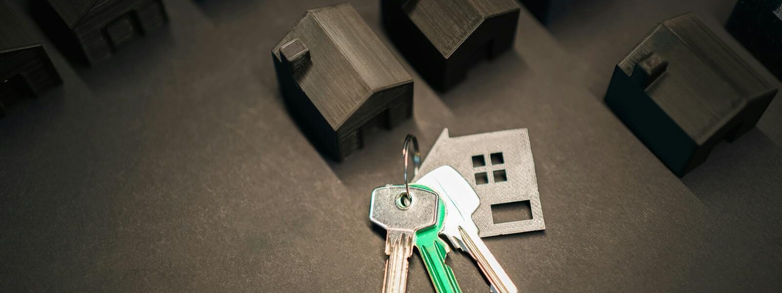 porte clé nouvelle maison immobilier quartier modèle fond sombre présentation