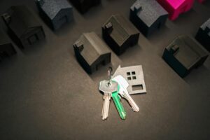 porte clé nouvelle maison immobilier quartier modèle fond sombre présentation